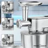 A close-up collage of a silver kitchen appliance, likely a stand mixer with a meat grinder attachment, shown from different angles. Produktbild-Vorschau