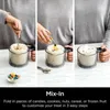 A person is shown adding mix-ins to a dessert in a clear container. Podgląd zdjęcia produktu