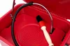 Inside view of a red workshop washing machine with a brush and a flexible hose. Produktbild-Vorschau