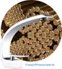 A modern silver faucet is shown in front of a background of many brass rods. Produktbild-Vorschau