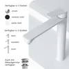 A white faucet is shown on a white surface, with text and icons on the left detailing color and size options, and a drain assembly at the bottom. Produktbild-Vorschau