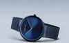 A blue Bering watch with a mesh band is shown against a light gray background. Podgląd zdjęcia produktu