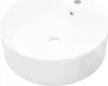 A white ceramic sink with a drain hole and an overflow hole. Náhled obrázku produktu
