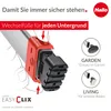Close-up of a ladder foot attachment being demonstrated, with options for garden and living spaces shown. Produktbild-Vorschau