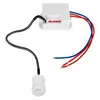 A white motion sensor with attached wires on a white background. Produktbild-Vorschau