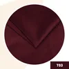 A close-up of a folded burgundy fabric swatch, presented in a circular cutout against a light beige and white background. A small burgundy rectangle with 'T03' in white text is in the bottom right corner. Anteprima dell’immagine prodotto