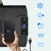 A hand is holding a smartphone connected to a black portable refrigerator. Icons representing features are displayed on the right side of the image. Náhled obrázku produktu