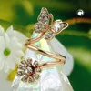 Ring 32mm Schmetterling und Blume mit weißen Glassteinen Produktbild-Vorschau 2