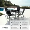 A garden furniture set with a table and chairs is shown outdoors by a pool with a view of the sea. Náhled obrázku produktu