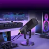 A gaming setup with a microphone, keyboard, speakers, and a monitor displaying audio levels. Produktbild-Vorschau
