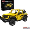 A yellow toy jeep model and its packaging. Podgląd zdjęcia produktu