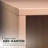 A close-up view of the edge of a wooden cabinet, highlighting its rounded ABS edges and the texture of the wood. Produktbild-Vorschau