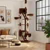A large cat tree is set up in a living room next to a window, with a sofa and coffee table nearby. Náhľad obrázku produktu