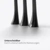 Close-up of the bottom parts of three black toothbrush heads with small white markings. Produktbild-Vorschau