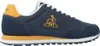 A side view of a Le Coq Sportif Astra 2 sports shoe. Podgląd zdjęcia produktu