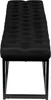A close-up, front view of a black upholstered bench with tufted detailing and a black metal frame. Náhled obrázku produktu