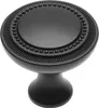 A black, round cabinet knob with a textured rim and beaded detail. Produktbild-Vorschau