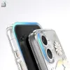 Close-up of two clear phone cases with decorative elements, showing the camera area and edges. Podgląd zdjęcia produktu