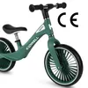 A close-up of a green balance bike. Voir les images du produit