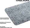 A close-up view of a textured rug with text overlays describing its features. Produktbild-Vorschau