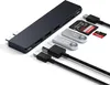 A Satechi Pro Hub Slim and accessories are arranged on a white background. Produktbild-Vorschau