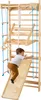 A young child is climbing on a wooden indoor gym set. Anteprima dell’immagine prodotto