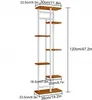 A multi-tiered plant stand with wooden shelves and white metal supports, shown with dimensions indicated by text overlays. Podgląd zdjęcia produktu