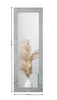 A tall, rectangular mirror with a decorative frame, reflecting a vase with dried pampas grass. Náhled obrázku produktu