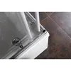 A close-up view of the corner of a shower enclosure, showing the frame and glass. Produktbild-Vorschau