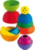 A collection of colorful stacking cups and balls for children. Produktbild-Vorschau