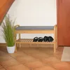 A shoe rack with a bench and storage shelves, placed in an entryway or hallway. Produktbild-Vorschau