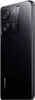 A black smartphone is shown from a diagonal angle, highlighting its rear camera module and brand logo. Podgląd zdjęcia produktu