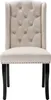 A front view of a beige upholstered dining chair with black wooden legs. Anteprima dell’immagine prodotto