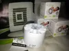 Several boxes of an air fan product, along with a disassembled fan and a guarantee leaflet, are arranged on a patterned surface. Náhled obrázku produktu