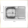 A top-down view of a stainless steel sink with dimensions indicated by arrows and text. Voir les images du produit