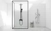 A modern black shower system in a minimalist bathroom. Produktbild-Vorschau