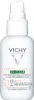 A white bottle of Vichy Capital Soleil UV Clear Anti-Imperfections Water SPF50. Anteprima dell’immagine prodotto