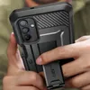 A person is holding a black smartphone with a protective case, demonstrating the case's kickstand feature. Náhľad obrázku produktu