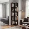 A corner bookshelf filled with books and decorative items in a living room setting. Náhľad obrázku produktu