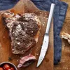 A cooked steak with a knife and cherry tomatoes on a wooden board. Anteprima dell’immagine prodotto
