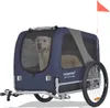 A dog is inside a blue and gray dog trailer for bicycles. Produktbild-Vorschau