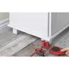A hand is using a furniture mover tool to lift a white cabinet off the floor. Produktbild-Vorschau