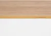 A close-up view of the edge of a wooden table. Produktbild-Vorschau