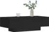 A black coffee table with a cup and saucer and a vase with greenery on top, set against a white background. Náhľad obrázku produktu