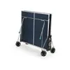 A folded blue and silver outdoor table tennis table with black wheels, shown from the back. Produktbild-Vorschau