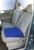 A blue seat cushion is placed on the driver's seat of a car. Produktbild-Vorschau