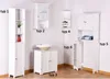A collection of white bathroom storage cabinets and shelves against a white wall. Náhled obrázku produktu