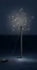 A lit-up star decoration on a dark background. Produktbild-Vorschau
