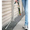 A person is holding a weed burner near a wooden wall. Produktbild-Vorschau