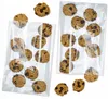 Several cellophane bags filled with cookies are arranged on a white background. Podgląd zdjęcia produktu